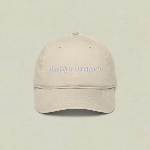Ecru SaladPower cap with “always organic” embroidered in white across the front